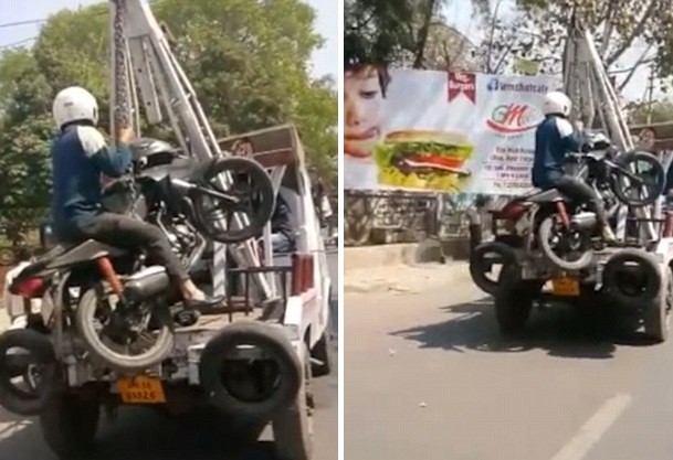 印度男子骑摩托车违停拒付罚款 人车一并被拖走